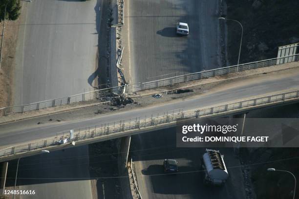 An aerial view of a bombarded bridge in Beirut, 13 September 2006. AFP PHOTO / DOMINIQUE FAGET