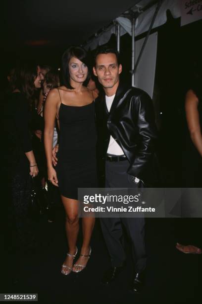 American singer-songwriter Marc Anthony and Puerto Rican beauty queen Dayanara Torres attend an In Style magazine party, held at Chelsea Piers in New...