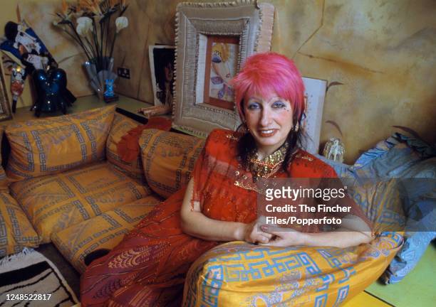 British fashion designer Zandra Rhodes at home in London, circa 1986.