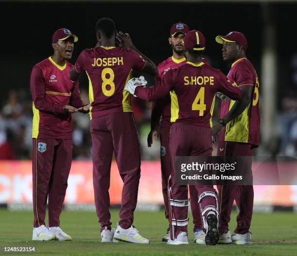 West Indies players celebrate the dismissal of Rassie van der Dussen of South Africa during the 2nd Betway ODI match between South Africa and West...