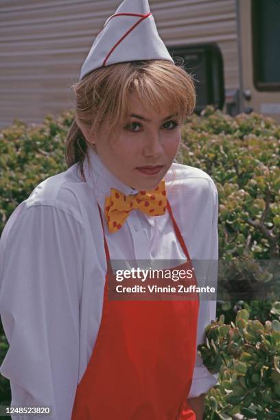 American actress Christina Applegate in costume as her character 'Sue Ellen Crandell' in a publicity portrait for the film 'Don't Tell Mom the...