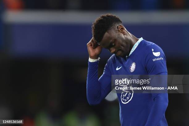 Benoit Badiashile of Chelsea dejected at full time of the Premier League match between Chelsea FC and Everton FC at Stamford Bridge on March 18, 2023...