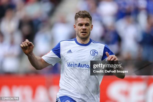 Simon Terodde of FC Schalke 04 looks on during the Bundesliga match between FC Augsburg and FC Schalke 04 at WWK-Arena on March 18, 2023 in Augsburg,...