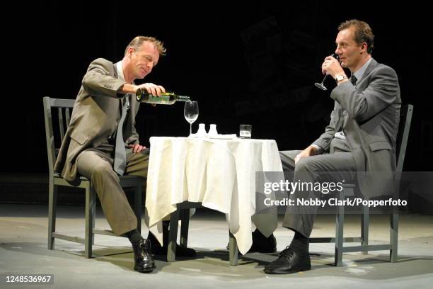 British actors Hugo Speer and Aden Gillett performing in a dress rehearsal for Harold Pinter's "Betrayal", directed by Sir Peter Hall at the Theatre...