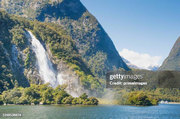 wide angle view in the milford sound fiord fiordland national park new zealand in south island new zealand - southland new zealand stock pictures, royalty-free photos & images