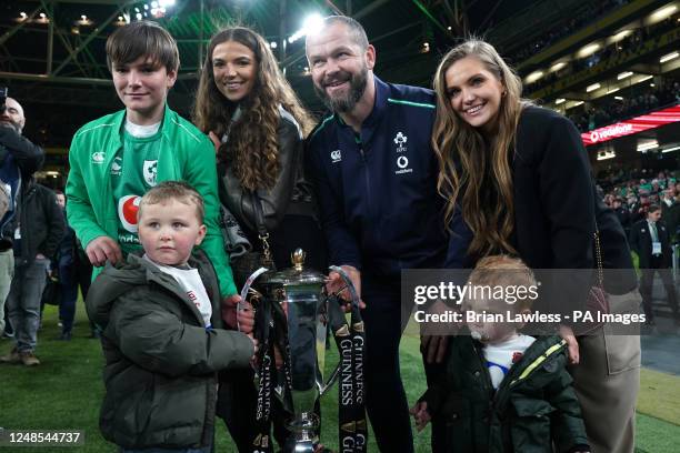 Ireland head coach Andy Farrell and family pose with the trophy after the Guinness Six Nations match at Aviva Stadium, Dublin. Picture date: Saturday...