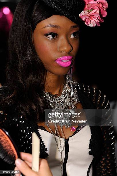 Model backstage at the Betsey Johnson Spring 2012 fashion show during Mercedes-Benz Fashion Week at The Theater at Lincoln Center on September 12,...