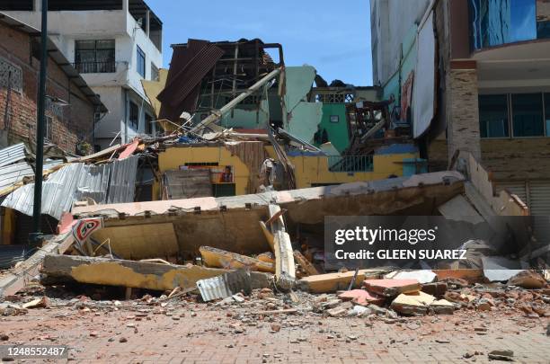 Destroyed buildings are seen after an earthquake in the city of Machala, Ecuador on March 18, 2023. - Four dead in southern Ecuador and damage to...