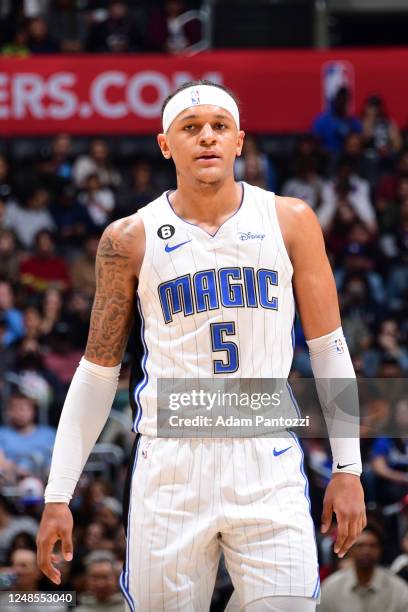 Paolo Banchero of the Orlando Magic looks on during the game against the LA Clippers on March 18, 2023 at Crypto.Com Arena in Los Angeles,...