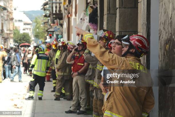 Firefighters conduct search and rescue operations after 6,8 magnitude earthquake hit the town of Balao in Ecuadorâs Azuay province on March 18, 2023...