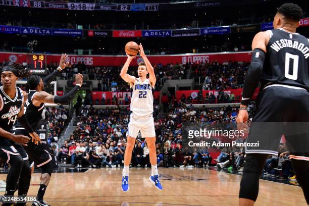 Franz Wagner of the Orlando Magic shoots a three point basket during the game against the LA Clippers on March 18, 2023 at Crypto.Com Arena in Los...