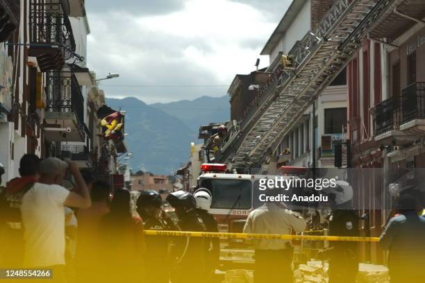 Firefighters conduct search and rescue operations after 6,8 magnitude earthquake hit the town of Balao in Ecuadorâs Azuay province on March 18, 2023...