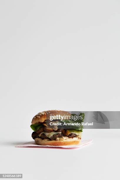 fontina grilled mushroom burger - american cheeseburger stock pictures, royalty-free photos & images