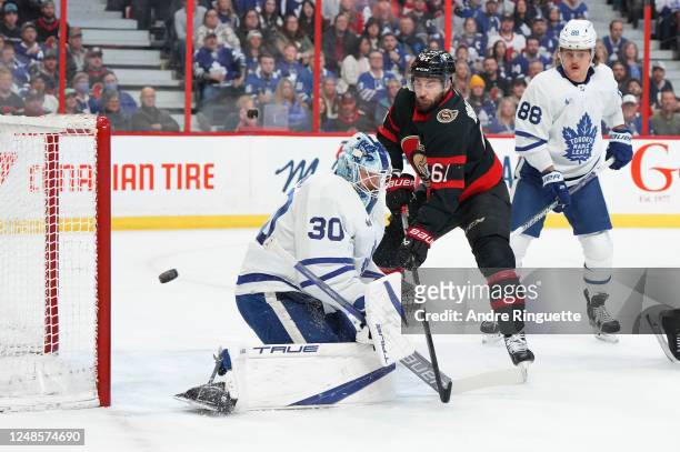 Derick Brassard of the Ottawa Senators battles for position in front of Matt Murray of the Toronto Maple Leafs at Canadian Tire Centre on March 18,...