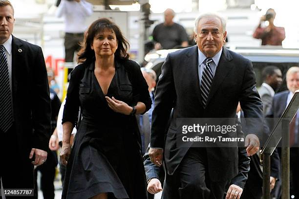 Anne Sinclair and Dominique Strauss-Kahn enter Manhattan Criminal Court to attend a status hearing on the sexual assault charges against Strauss-Kahn...