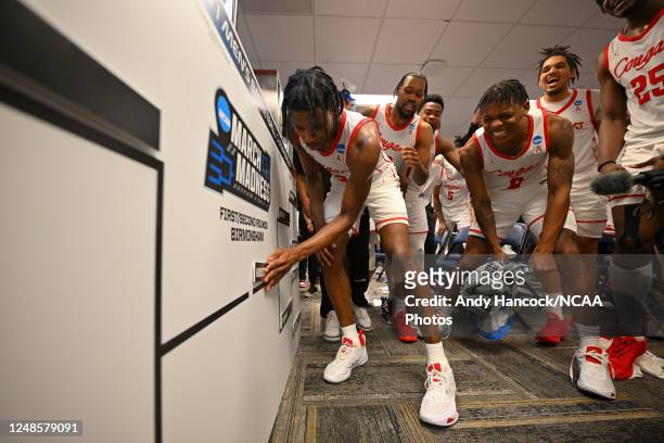 Tramon Mark and the Houston Cougars celebrate after their win against the Auburn Tigers during the second round of the 2023 NCAA Men's Basketball...