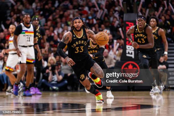 Gary Trent Jr. #33 of the Toronto Raptors dribbles up the court during second half of their NBA game against the Minnesota Timberwolves at Scotiabank...