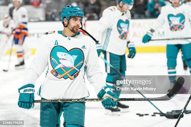 Mario Ferraro of the San Jose Sharks skates during warmups wearing special Pride Night jerseys before the game against the New York Islanders at SAP...