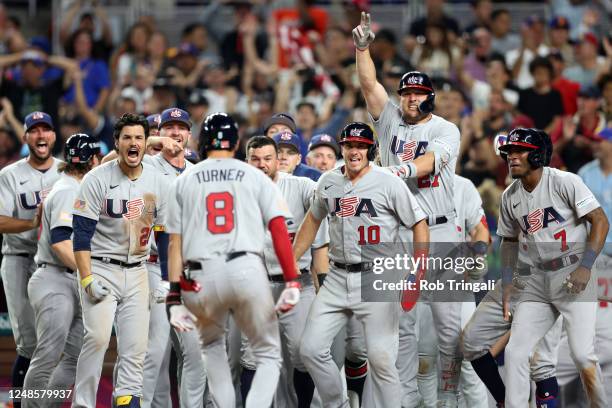Members of Team USA celebrate after Trea Turner hit a grand slam in the eighth inning during the 2023 World Baseball Classic Quarterfinal game...