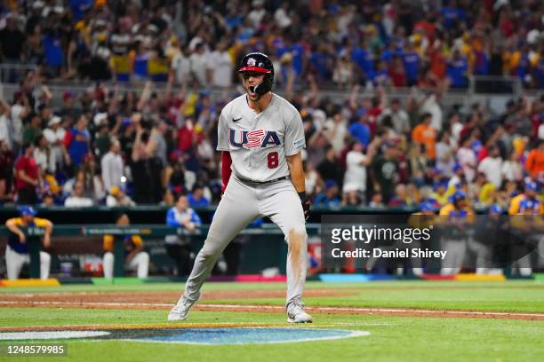 Trea Turner of Team USA reacts after hitting a grand slam to take the lead in the eighth inning during the 2023 World Baseball Classic Quarterfinal...