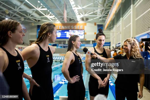 University of Virginia wins the 400 free relay during the Division I Womens Swimming & Diving Championships held at the Allan Jones Aquatic Center on...