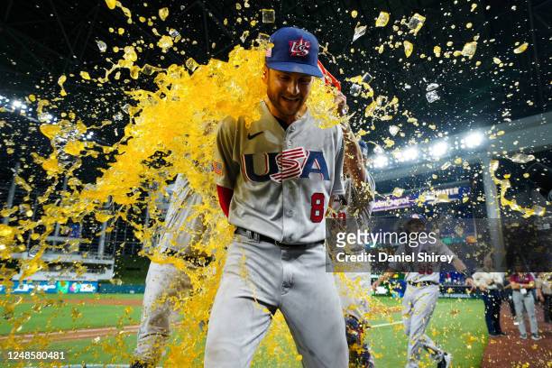 Trea Turner of Team USA is given a Gatorade bath during a post-game interview after Team USA defeated Team Venezuela in the 2023 World Baseball...