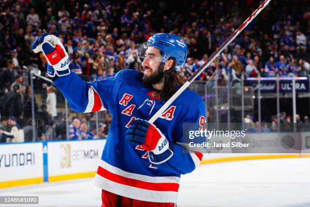 Mika Zibanejad of the New York Rangers celebrates after a 6-0 win against the Pittsburgh Penguins at Madison Square Garden on March 18, 2023 in New...