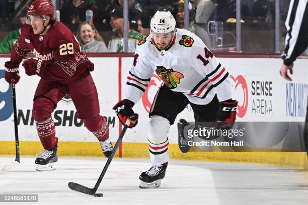 Boris Katchouk of the Chicago Blackhawks skates with the puck during the first period against the Arizona Coyotes at Mullett Arena on March 18, 2023...