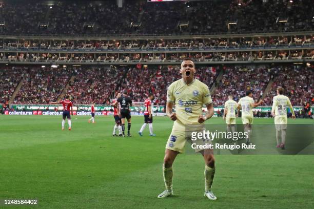 Jonathan Rodríguez of America celebrates after scoring the team's second goal during the 12th round match between Chivas and America as part of the...