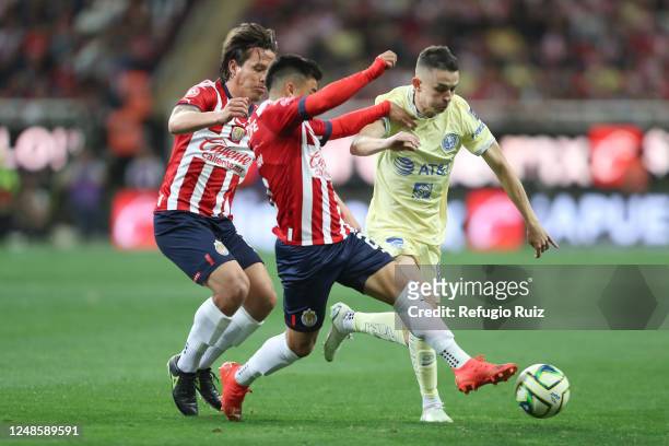 Fernando Beltran of Chivas fights for the ball with �Álvaro Fidalgo of America during the 12th round match between Chivas and America as part of the...