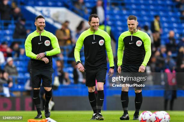 Match officials The referee Darren England, Assistant referee Dan Cook and Assistant referee Dan Robathon warming up before the Premier League match...