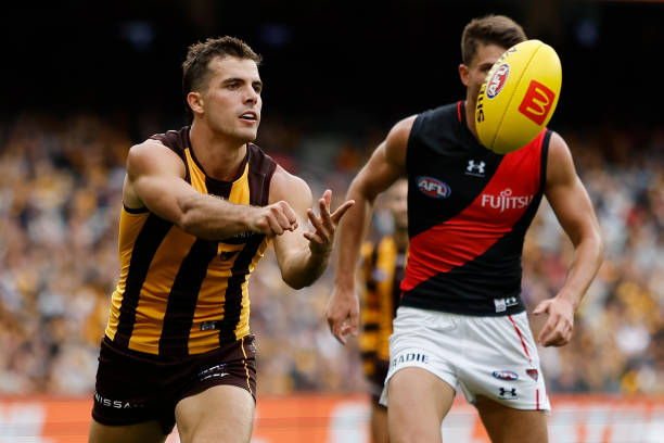 Finn Maginness of the Hawks in action during the 2023 AFL Round 01 match between the Hawthorn Hawks and the Essendon Bombers at the Melbourne Cricket...