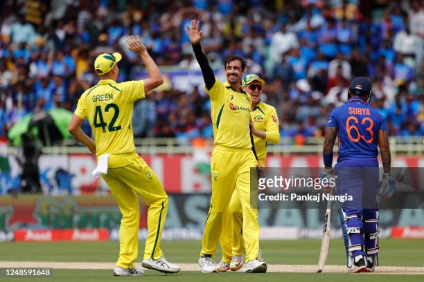 Mitchell Starc of Australia celebrates the wicket of Suryakumar Yadav of Indiaduring game two in the One Day International Series between India and...