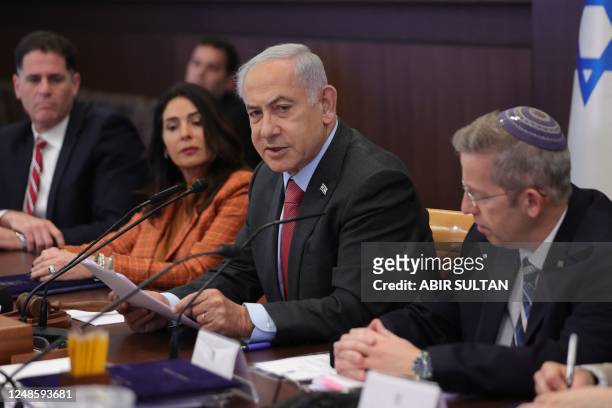 Israeli Prime Minister Benjamin Netanyahu attends the weekly cabinet meeting at his office in Jerusalem, on March 19, 2023.