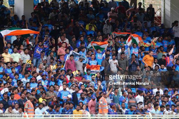Fans cheer during game two in the One Day International Series between India and Australia at Dr YS Rajasekhara Reddy ACA-VDCA Cricket Stadium, on...