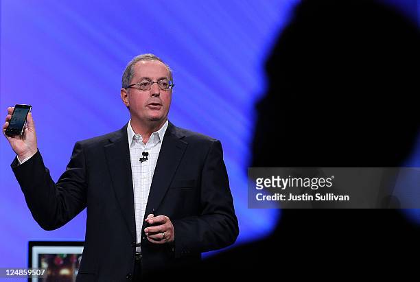 Intel CEO Paul Otellini holds a Google Android phone that uses an Intel chip as he delivers a keynote address during the 2011 Intel Developer Forum...