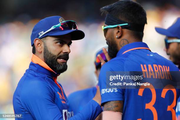 Virat Kohli of India and Hardik Pandya of India interact during game two in the One Day International Series between India and Australia at Dr YS...