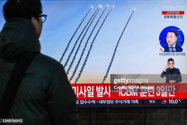 Screen at the Yongsan Railway Station in Seoul, shows file footage of North Korea's missile launch during a news program. North Korea fired a...