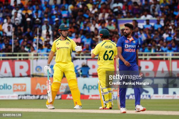 Mitchell Marsh of Australia and Travis Head of Australia interact during game two in the One Day International Series between India and Australia at...