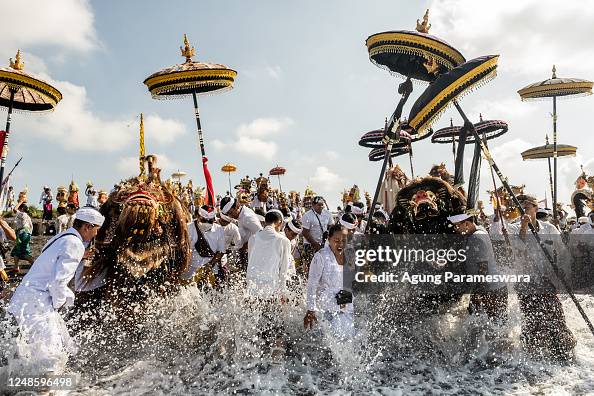 Masked Ritual Bali Balinese Hindus people carry sacred mask, sacred effigies and ritual ...