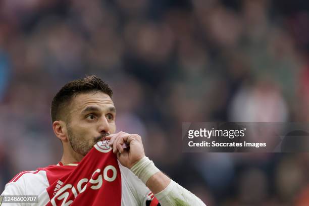Dusan Tadic of Ajax celebrates 2-1 during the Dutch Eredivisie match between Ajax v Feyenoord at the Johan Cruijff Arena on March 19, 2023 in...