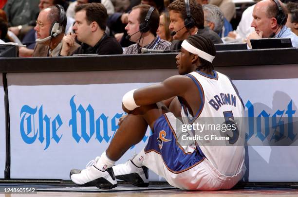 Kwame Brown of the Washington Wizards waits to come into the game against the Phoenix Suns on January 27, 2003 at the MCI Center in Washington DC....