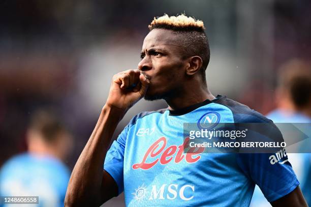 Napoli's Nigerian forward Victor Osimhen celebrates after scoring his side's third goal during the Italian Serie A football match between Torino and...
