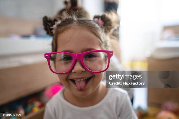 cute childhood innocence - protruding stock pictures, royalty-free photos & images