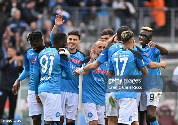Tanguy Ndombele of SSC Napoli celebrates after scoring Napoli's fourth goal with teammates during the Serie A match between Torino FC and SSC Napoli...
