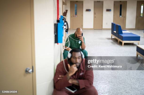 Inmates make phone calls at the Little Scandinavia unit at SCI Chester on Thursday, March 9, 2023 in Chester, PA. The unit is designed to give...