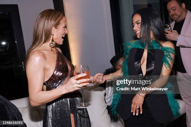 Jennifer Lopez and Christina Milian attend the launch of JLo Jennifer Lopez for Revolve Collection at a private residence on March 18, 2023 in...