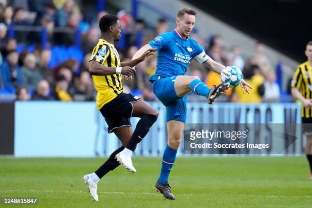 Nicolas Isimat Mirin of Vitesse, Luuk de Jong of PSV during the Dutch Eredivisie match between Vitesse v PSV at the GelreDome on March 19, 2023 in...
