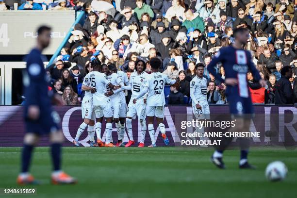 Rennes' Cameroonian forward Karl Toko Ekambi celebrates scoring his team's first goal during the French L1 football match between Paris Saint-Germain...