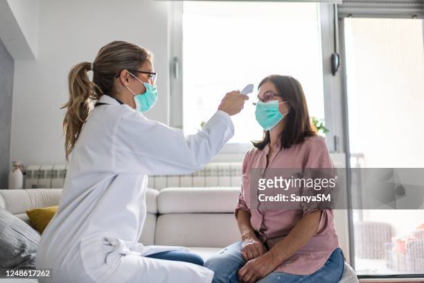 healthcare worker at home visit - visit stock pictures, royalty-free photos & images